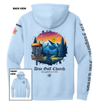 Light blue hoodie with disc golf-themed design on the back, featuring mountains and trees, with 'Disc Golf Church' branding.