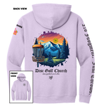 Lavender hoodie with disc golf-themed design on the back, featuring mountains and trees, with 'Disc Golf Church' branding.