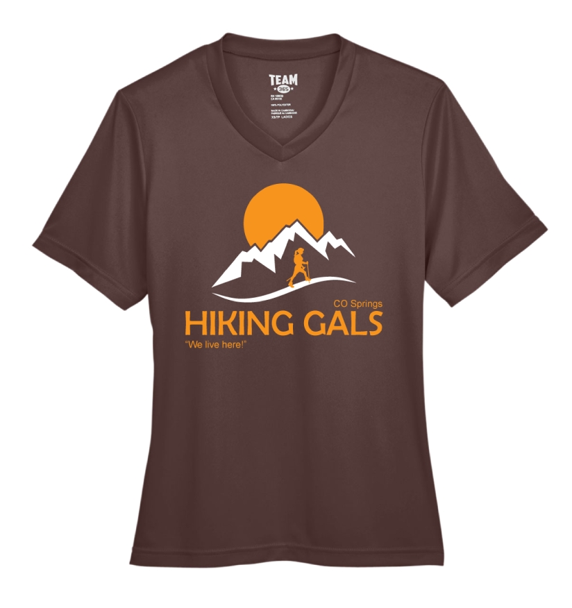 Brown t-shirt with 'Hiking Gals' logo featuring mountains and a sun