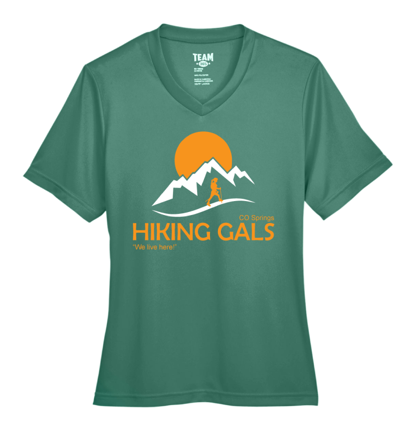 Green t-shirt with 'Hiking Gals' logo featuring a mountain and sun design