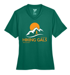 Green t-shirt with 'Hiking Gals' logo featuring mountains and a sun on a white background