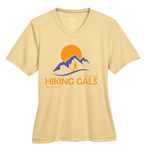 Beige t-shirt with 'Hiking Gals' graphic design featuring mountains and a sun.