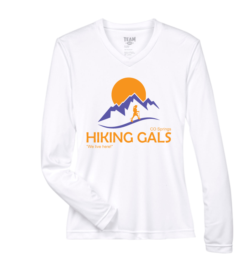 White long-sleeve shirt with 'Hiking Gals' logo featuring mountains and a sun