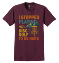 Maroon t-shirt with colorful disc golf graphic and text